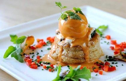 Wild mushroom, spinach and goat's cheese vol-au-vents with poached duck egg and pimento cream