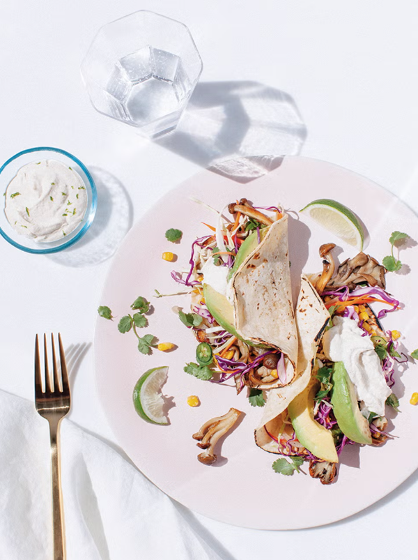 Wild mushrooms + corn tacos with spicy slaw and cashew crema