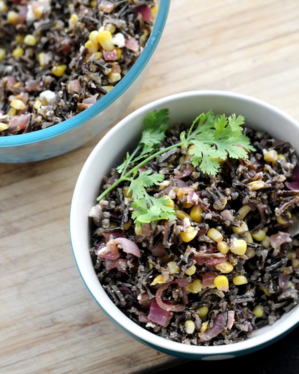 Wild rice salad with charred corn, cumin-spiced pecans, and feta