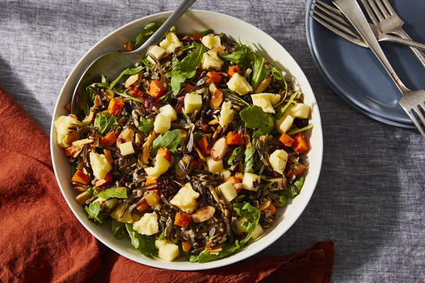 Wild rice salad with sweet potatoes, arugula & aged cheddar