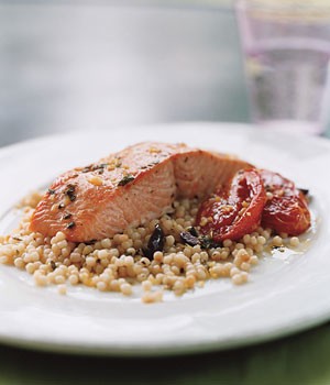 Wild salmon with pearl couscous, slow-roasted tomatoes, and lemon oregano oil