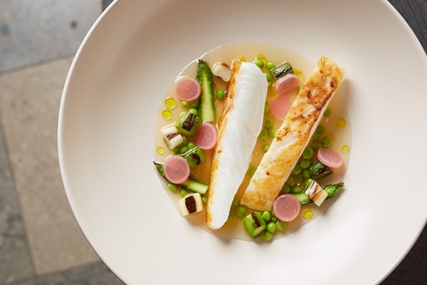 Wild turbot with smoked broth and charred vegetables