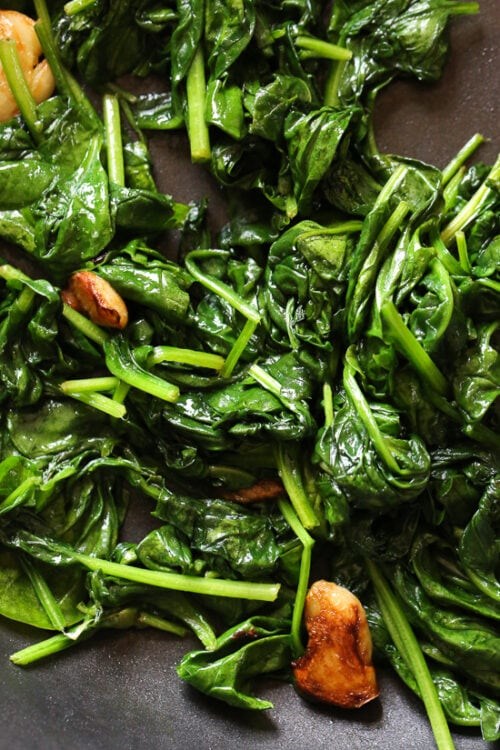 Wilted baby spinach with garlic and oil