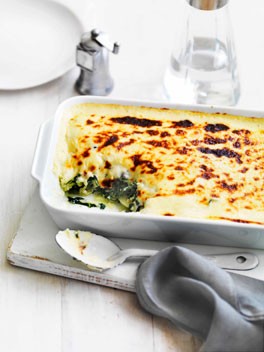 Wilted greens and potato with cheese sauce
