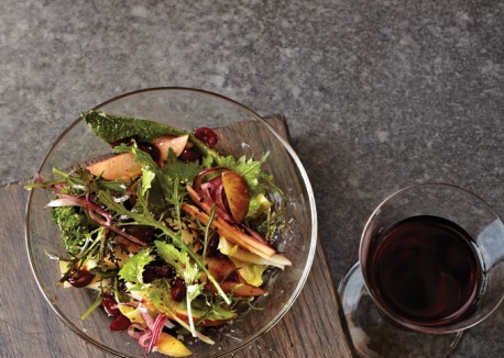 Wilted mustard greens salad with cranberry dressing