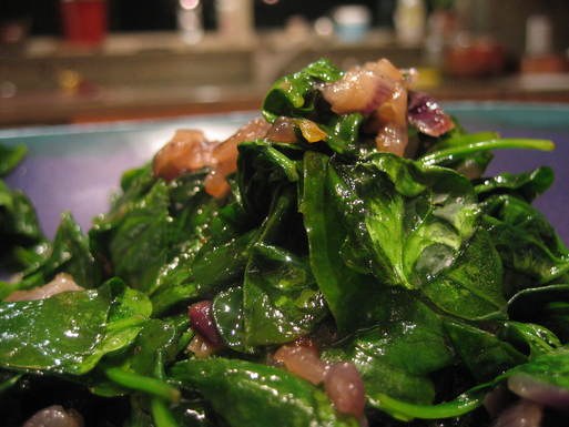 Wilted spinach salad with balsamic caramelized red onions