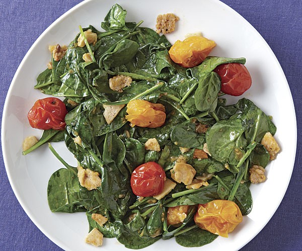 Wilted spinach salad with burst-tomato vinaigrette