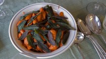 Wine-braised carrots with fried sage leaves