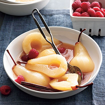 Wine-poached pears with raspberries