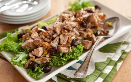 Winter chicken salad with walnuts and dried cherries