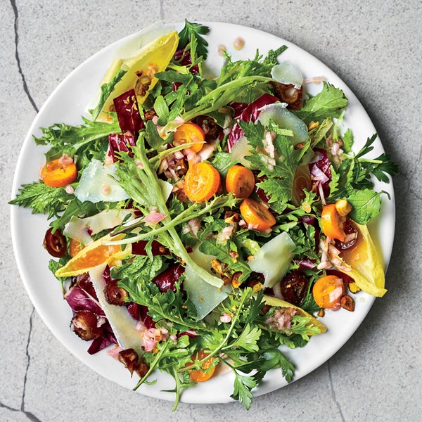 Winter chicory salad with kumquats and date dressing