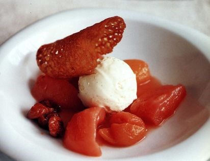 Winter fruit compote with rice pudding ice cream