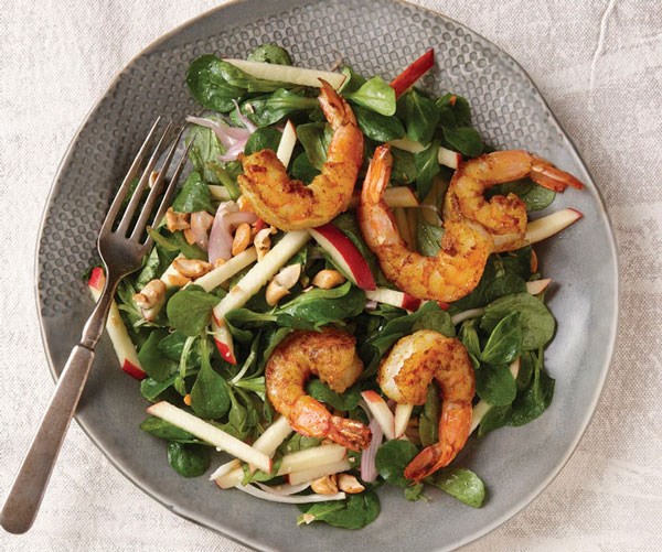 Winter salad with curried shrimp, apples, and cashews