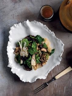 Wok-fried mushrooms with warrigal greens