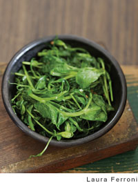 Wok-fried pea shoots