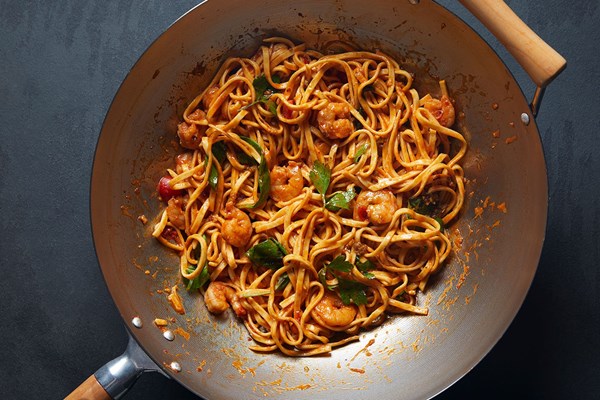 Wok fried spaghetti arrabbiata with shrimp