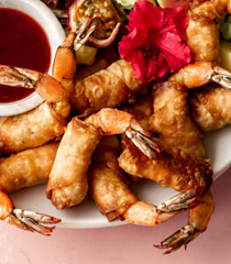 Wonton-wrapped fried shrimp with sweet and spicy guava sauce
