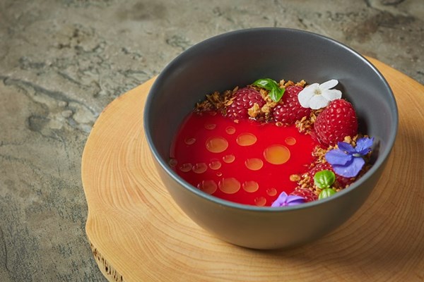 Woodruff panna cotta with raspberries and basil