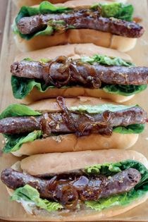 Wors roll and boozy onions