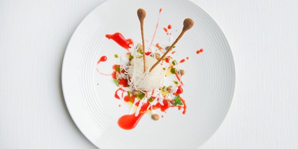 ‘Yarn balls’ stuffed with rice, buffalo mozzarella, tomato and basil (Arancino 2.0)