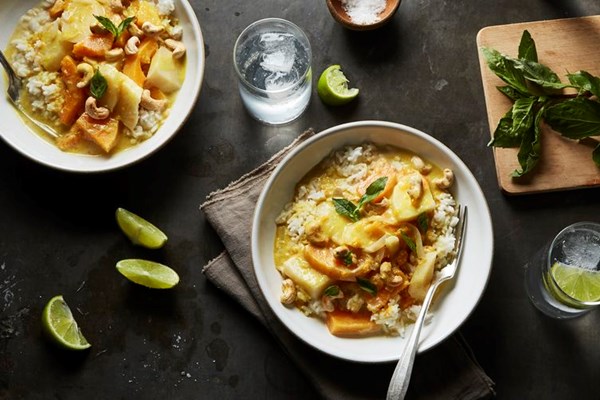 Yellow curry with root vegetables, cashews & basil