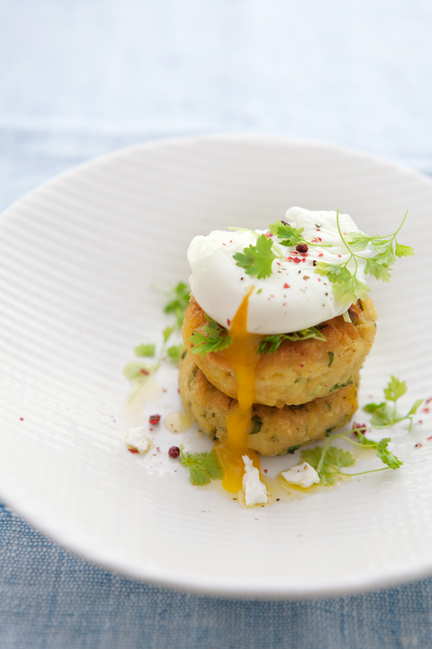 Yellow lentil cakes with poached eggs