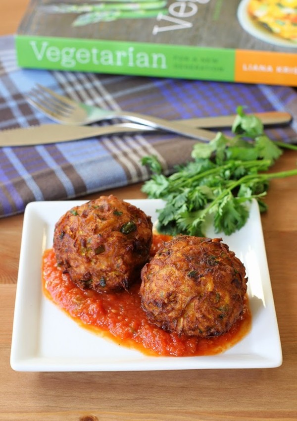 Yellow squash dumplings with spiced tomato sauce