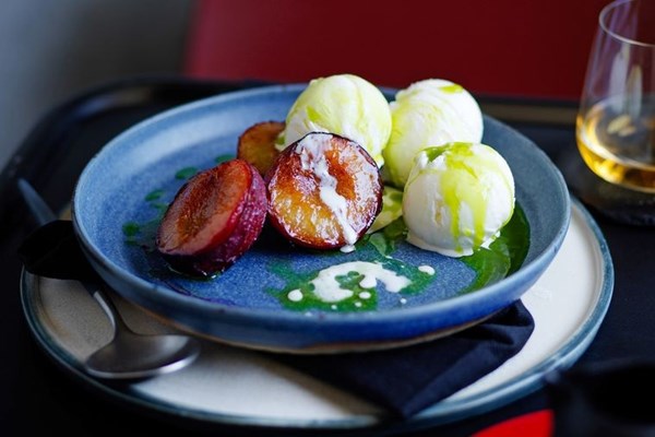 Yoghurt sorbet, roasted plums and rosemary oil [Clayton Wells]