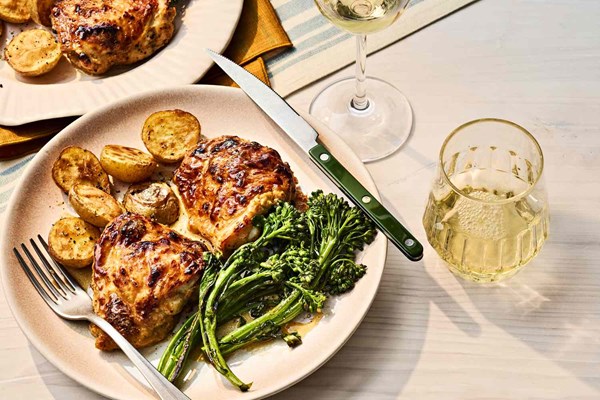 Yogurt-marinated chicken thighs with potatoes and broccolini