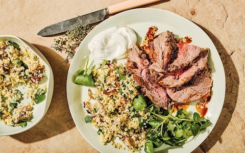 Yogurt-marinated roast leg of lamb with pistachio and orange couscous