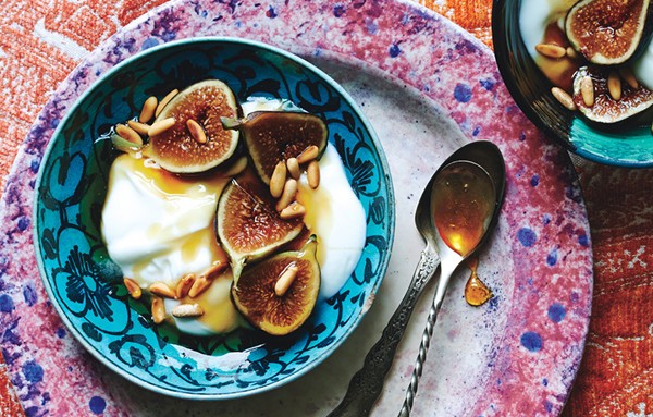 Yogurt with fresh figs, honey, and pine nuts