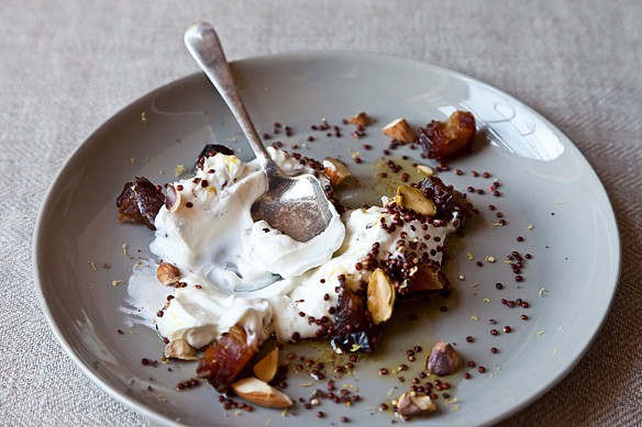 Yogurt with toasted quinoa, dates, and almonds
