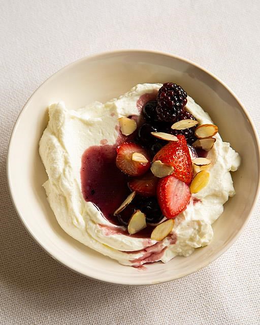 Yogurt with warm rosemary berries and maple syrup
