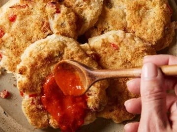 Yuca fritters with roasted red pepper sauce