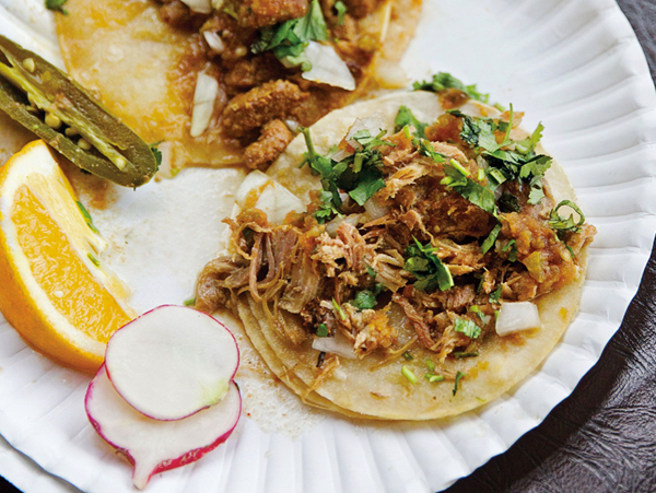Yucatán-style shredded pork tacos with achiote (Cochinita pibil tacos)