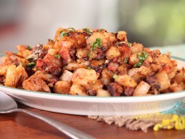 Yucca hash browns with bacon, onion, and lime-cilantro mojo