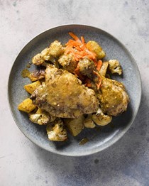 Za'atar chicken and vegetable traybake with tahini-lemon sauce