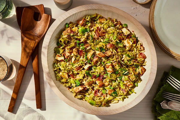 Za’atar-spiced Brussels sprouts & orzo with bacon-halloumi dressing