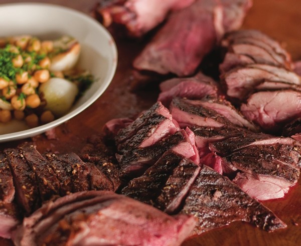 Zatar-rubbed leg of goat with fresh chickpeas, spring onion, and sorrel 