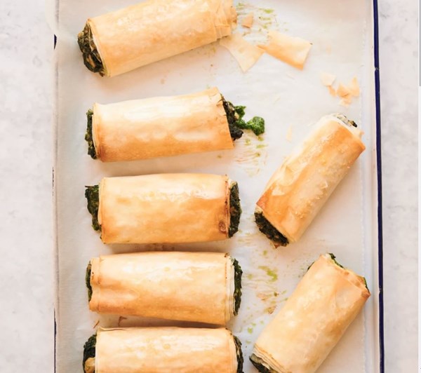 Zhoug-spiced tofu with spinach filo rolls
