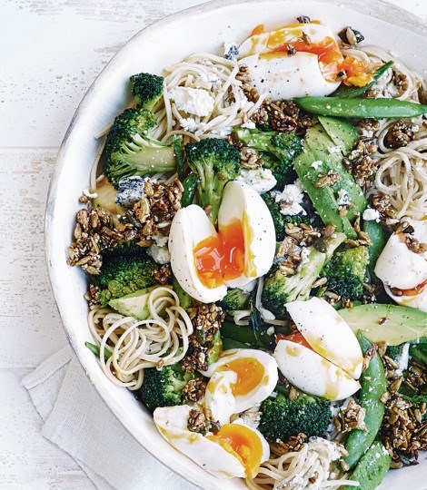 Zingy greens, goat's cheese and soft-boiled egg noodle salad