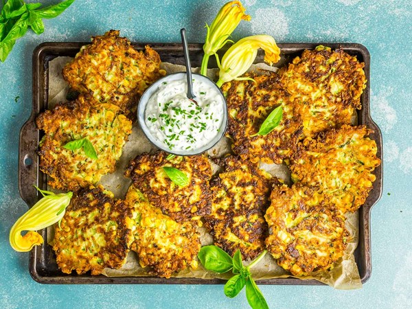Zucchini-and-corn fritters with herb sour cream