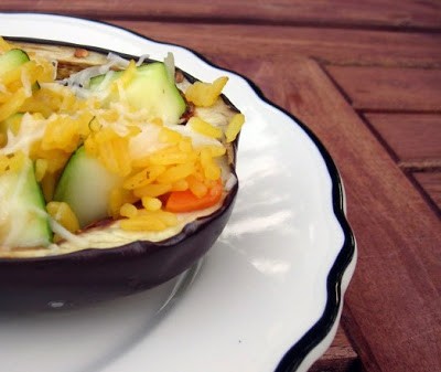 Zucchini and rice stuffed eggplant