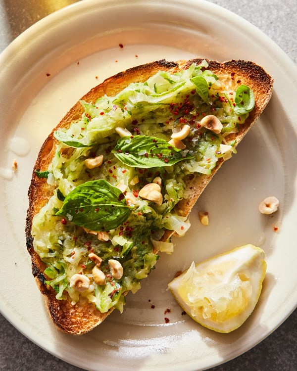 Zucchini butter toasts with hazelnuts and herbs