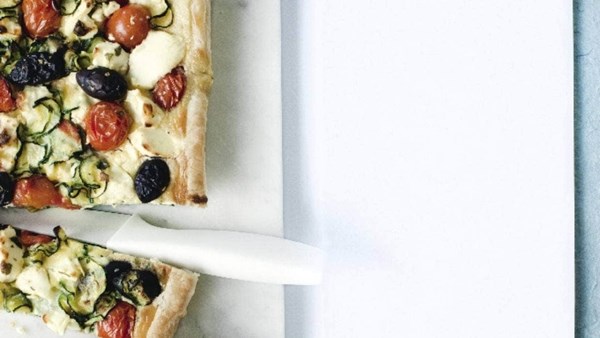 Zucchini, cherry tomato and goat's cheese tart