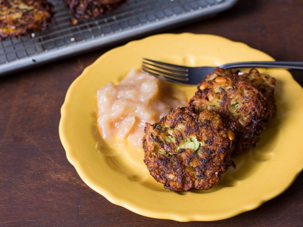 Zucchini latkes with Parmesan, pine nuts, and basil