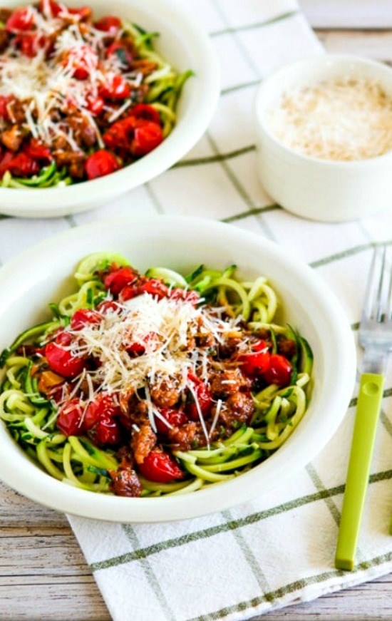 Zucchini noodles with spicy cherry tomato, sausage, garlic, and herb sauce