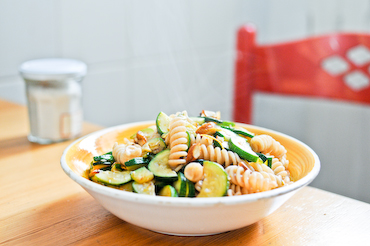Zucchini pasta with almonds and lemon zest