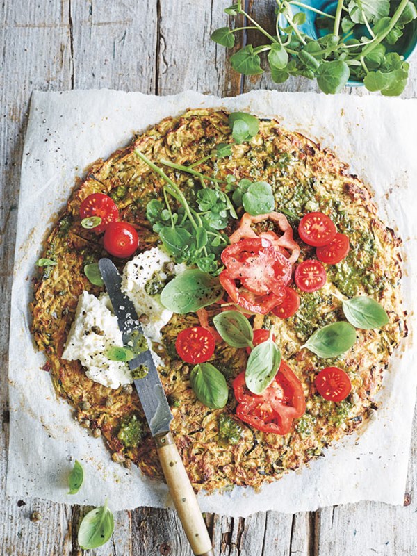 Zucchini pizza with pesto, tomato, basil and ricotta