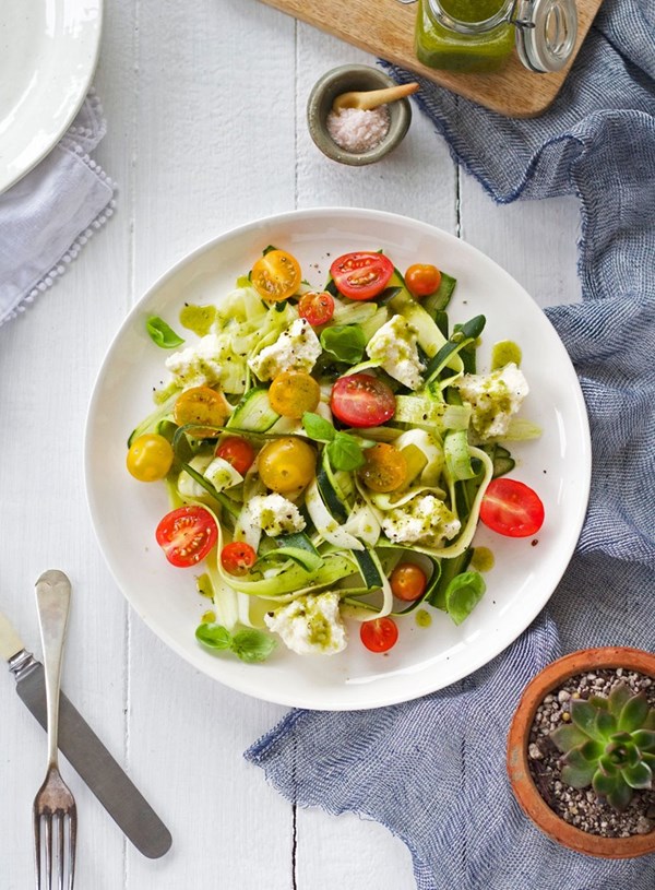 Zucchini ribbons with cherry tomatoes, ricotta and herby anchovy dressing
